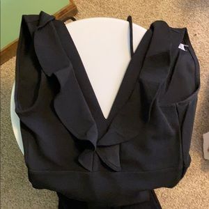 Sleeveless plunge neck jumpsuit. Size M